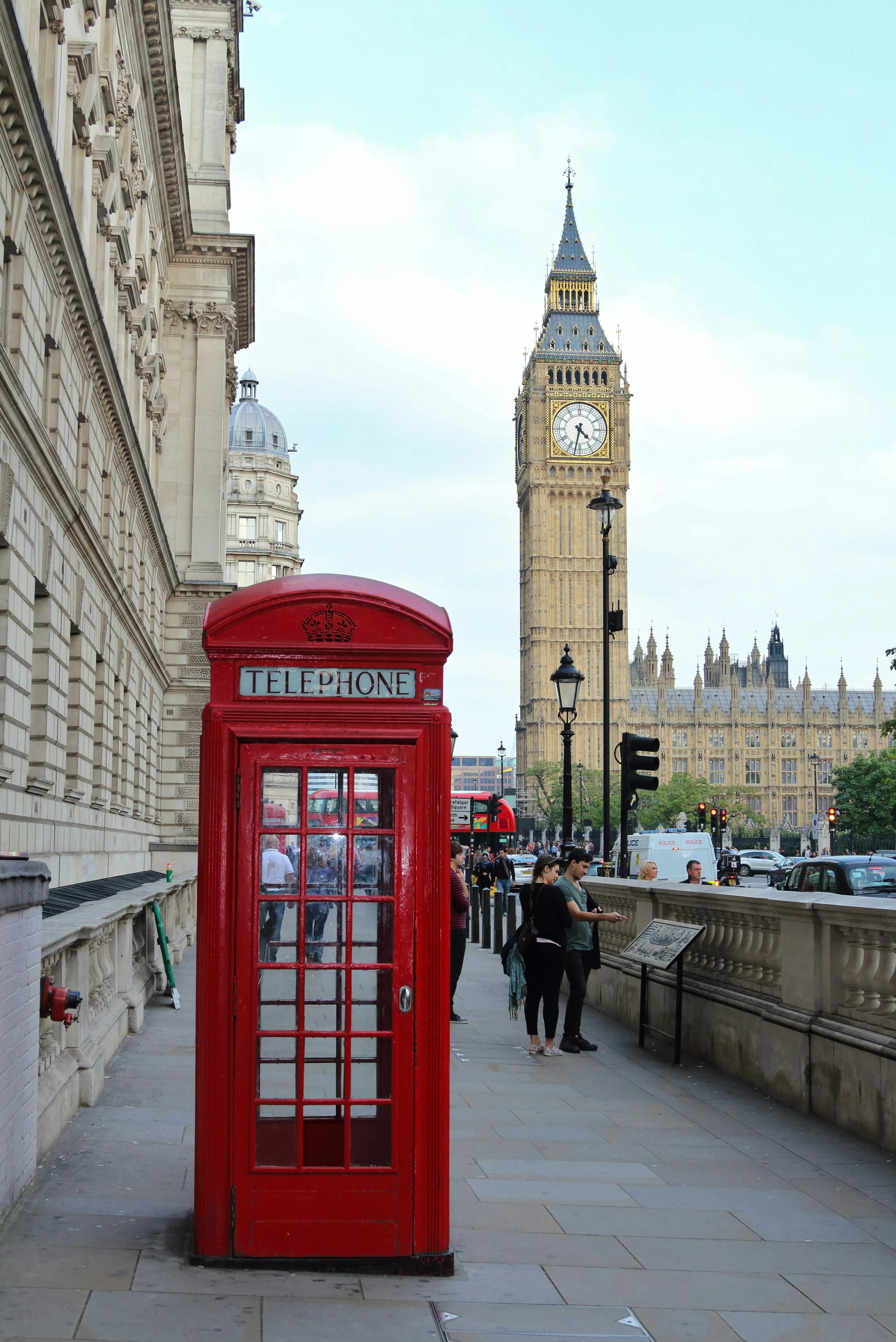 Red phone booth near Elizabeth Tower in London